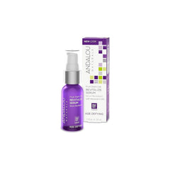Andalou Naturals Fruit Stem Cell Revitalize Serum bottle closeup showing antioxidant-enriched formula.