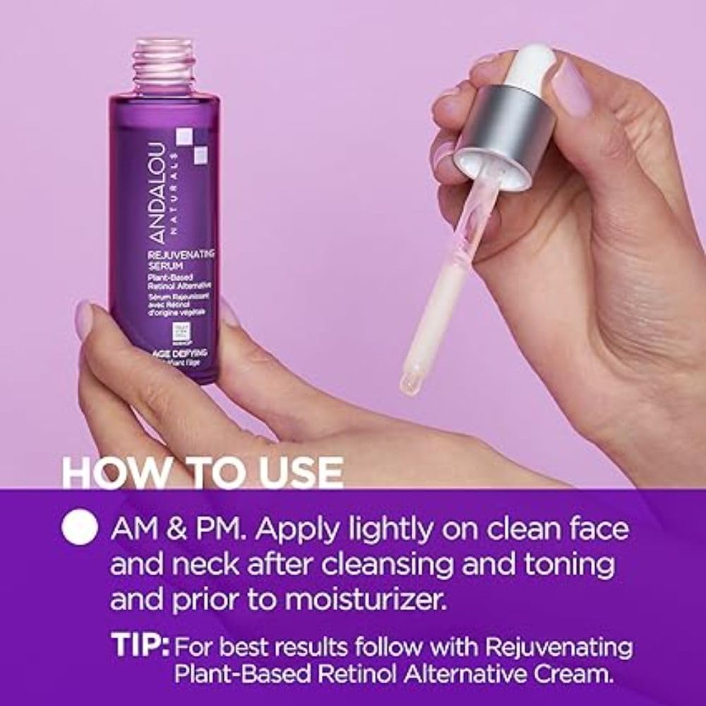 Andalou Naturals plant-based retinol serum being applied with clean fingertips.