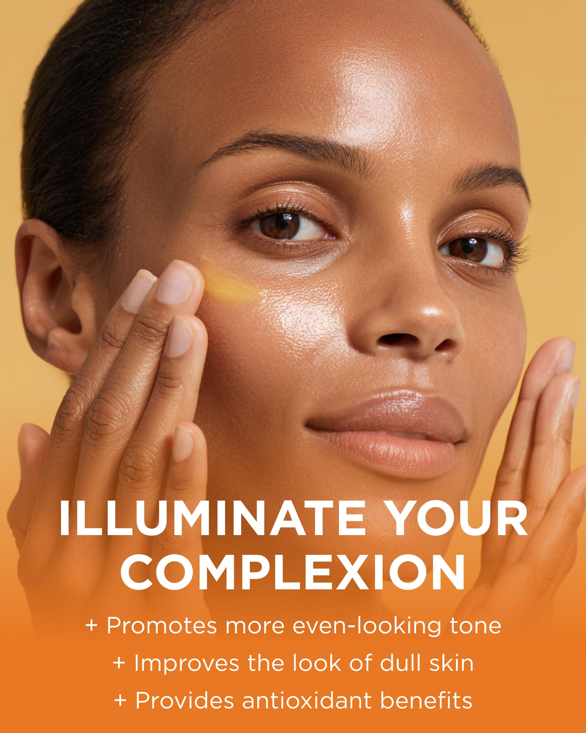Andalou Naturals Enlighten Serum application demonstrates easy smoothing for bright, hydrated skin.