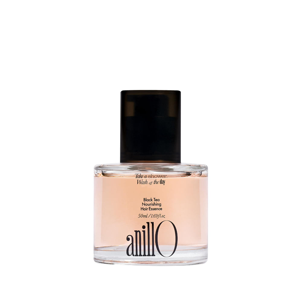 ANILLO Black Tea Nourishing Hair Essence bottle promises lightweight nourishment and silky shine.