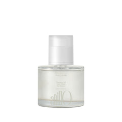 ANILLO Gardenia Veil bottle closeup demonstrates a lightweight leave-in for color-treated hair protection.