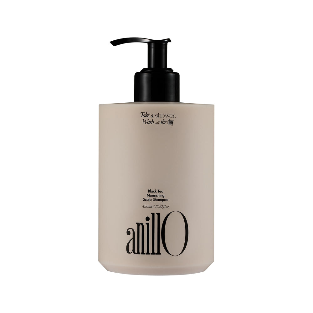 ANILLO vegan-nourishing-scalp-shampoo-bottle-pour demonstrates easy application for balanced scalp health.