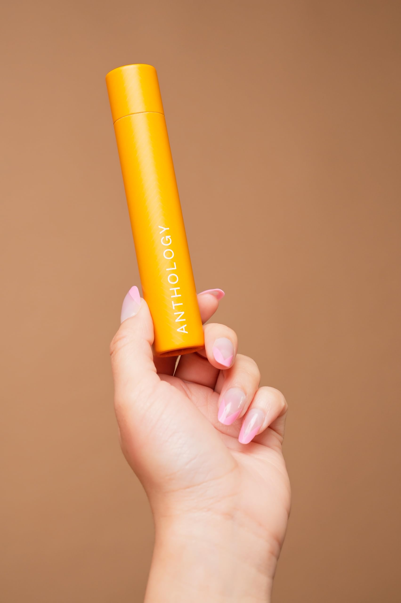 Anthology Amber Saffron 540 rollerball application shows precise on-the-go scent touch-ups.