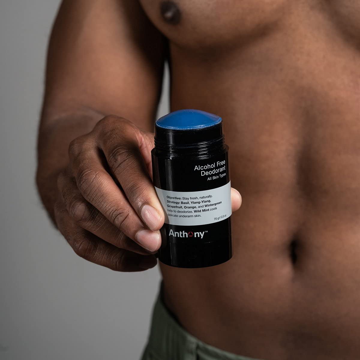 Anthony clear deodorant stick image emphasizing stain-free clothes and mess-free grooming