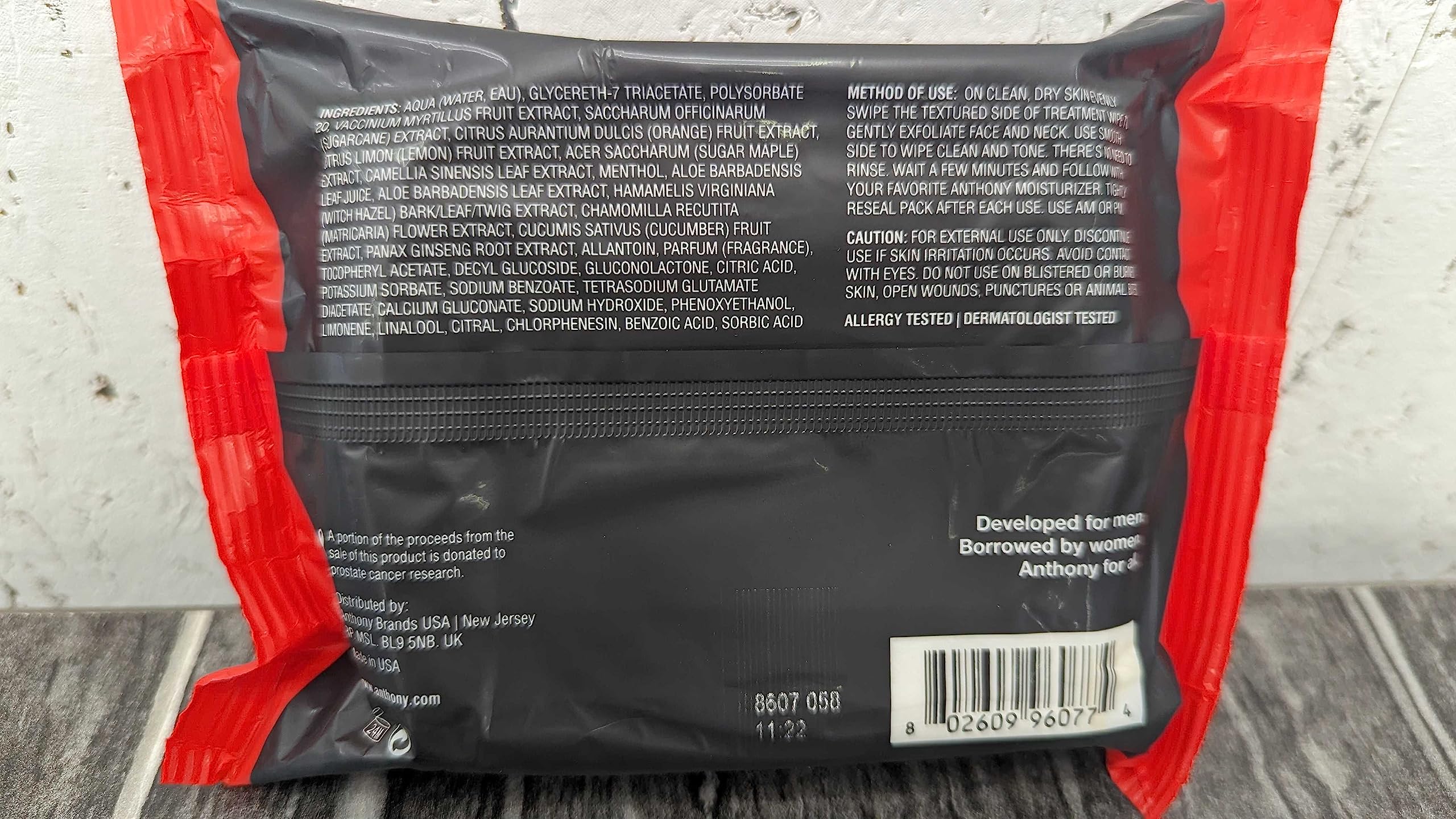 Anthony Glycolic Exfoliating Wipes dual-sided cloth showing exfoliate and hydrate