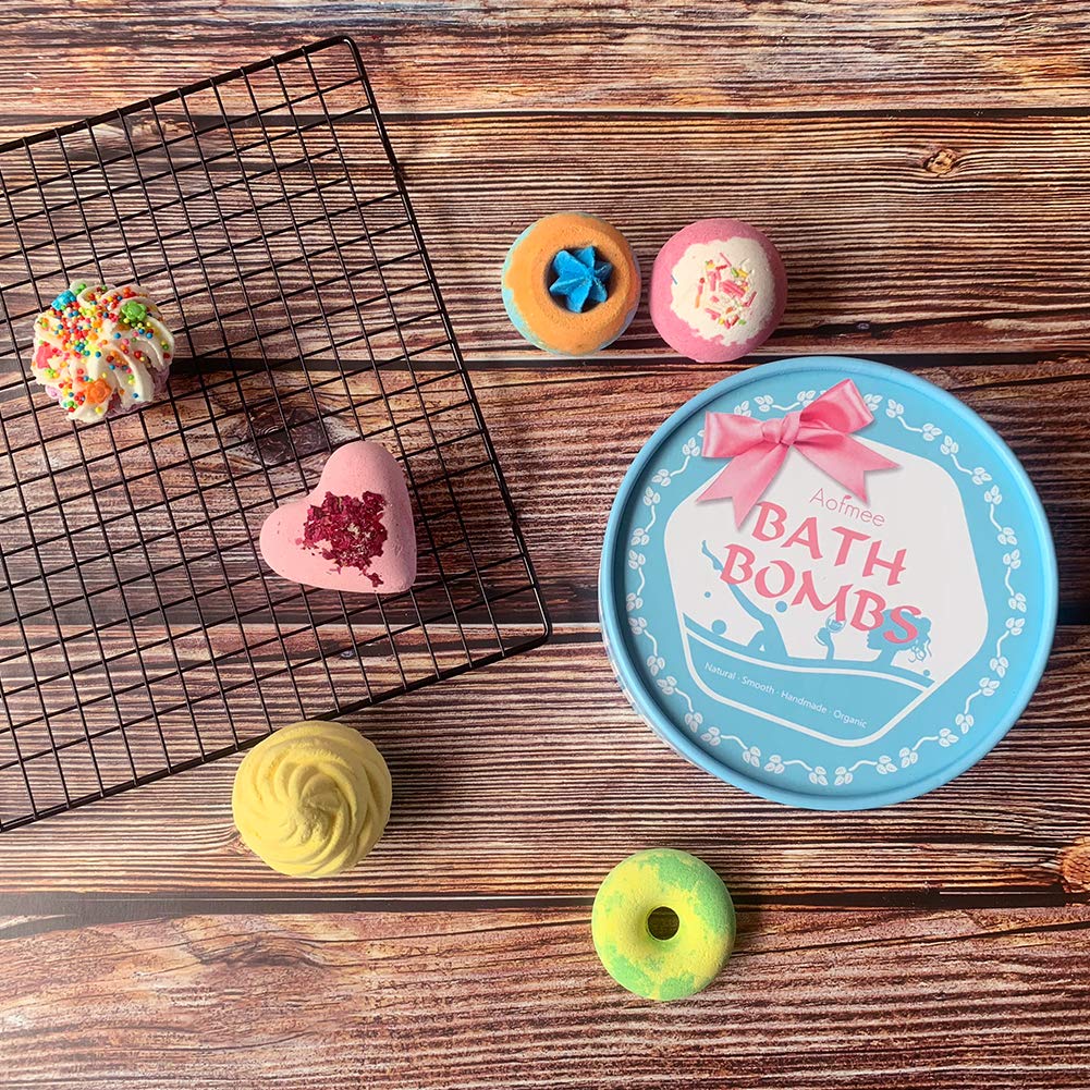 Aofmee bath bombs closeup featuring vitamins and shea butter hinting nourishment.