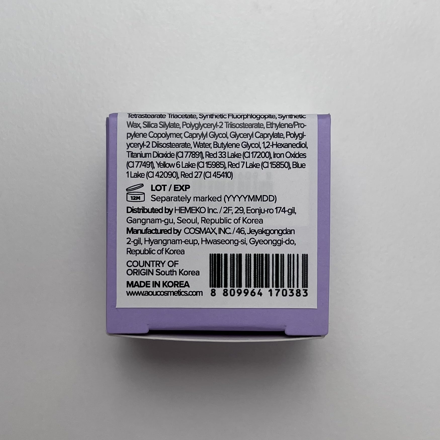 AOU Glowy Tint Balm with fruit extracts for moisturized, glossy lips.