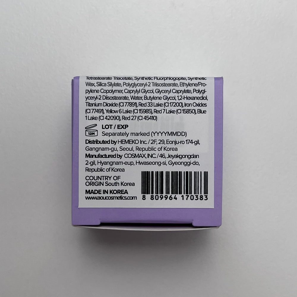 AOU Glowy Tint Balm with fruit extracts for moisturized, glossy lips.