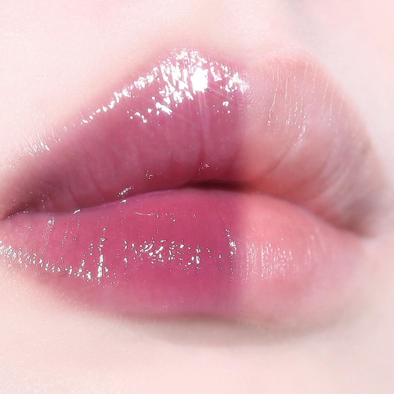 AOU Glowy Tint Balm on lips provides natural gloss and a fuller look.