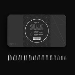APRÉS Gel-X natural round short tips arranged in a tray for precise fit and easy selection.