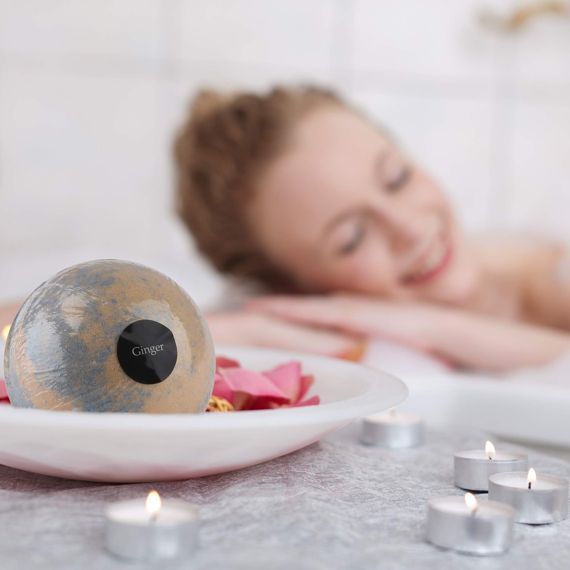 Aqua Elegante lemongrass tea tree fragrance bath bomb balances freshness in water.