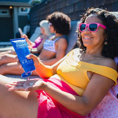 AQUA GUARD Pre-Swim Hair Defense smooths hair and guards against dryness.