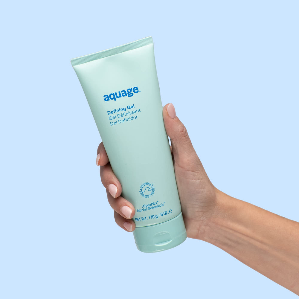 AQUAGE Defining Gel applying-styling scene suggests quick shaping for textured curls.