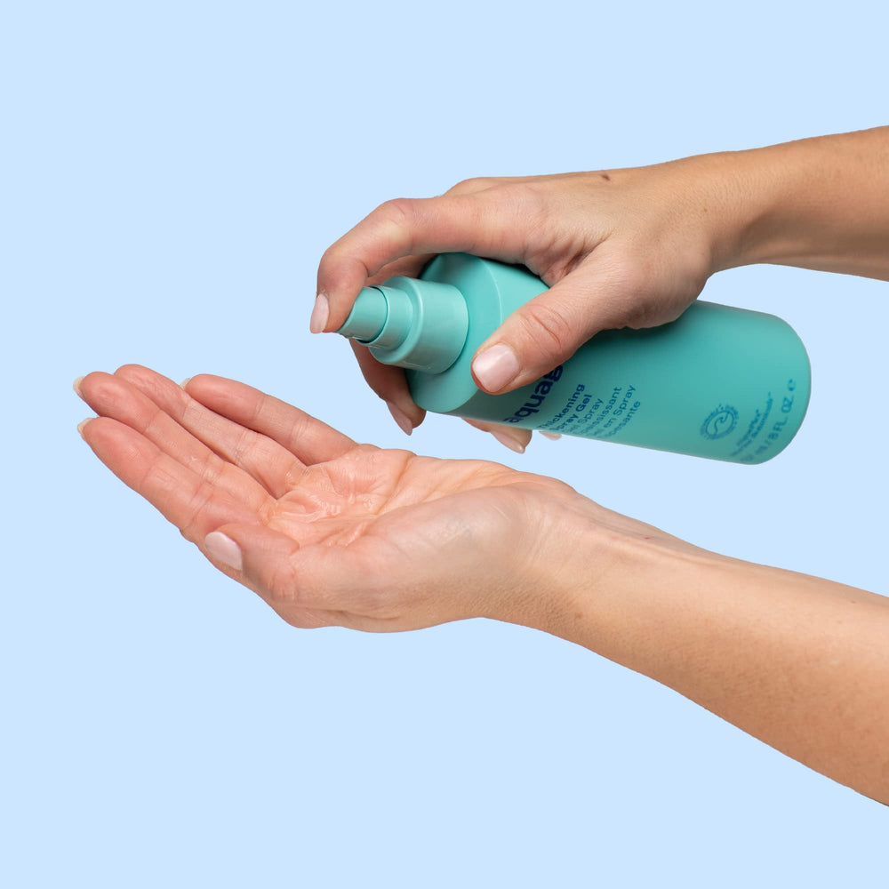 Aquage application mist image shows even coverage for thicker-looking hair