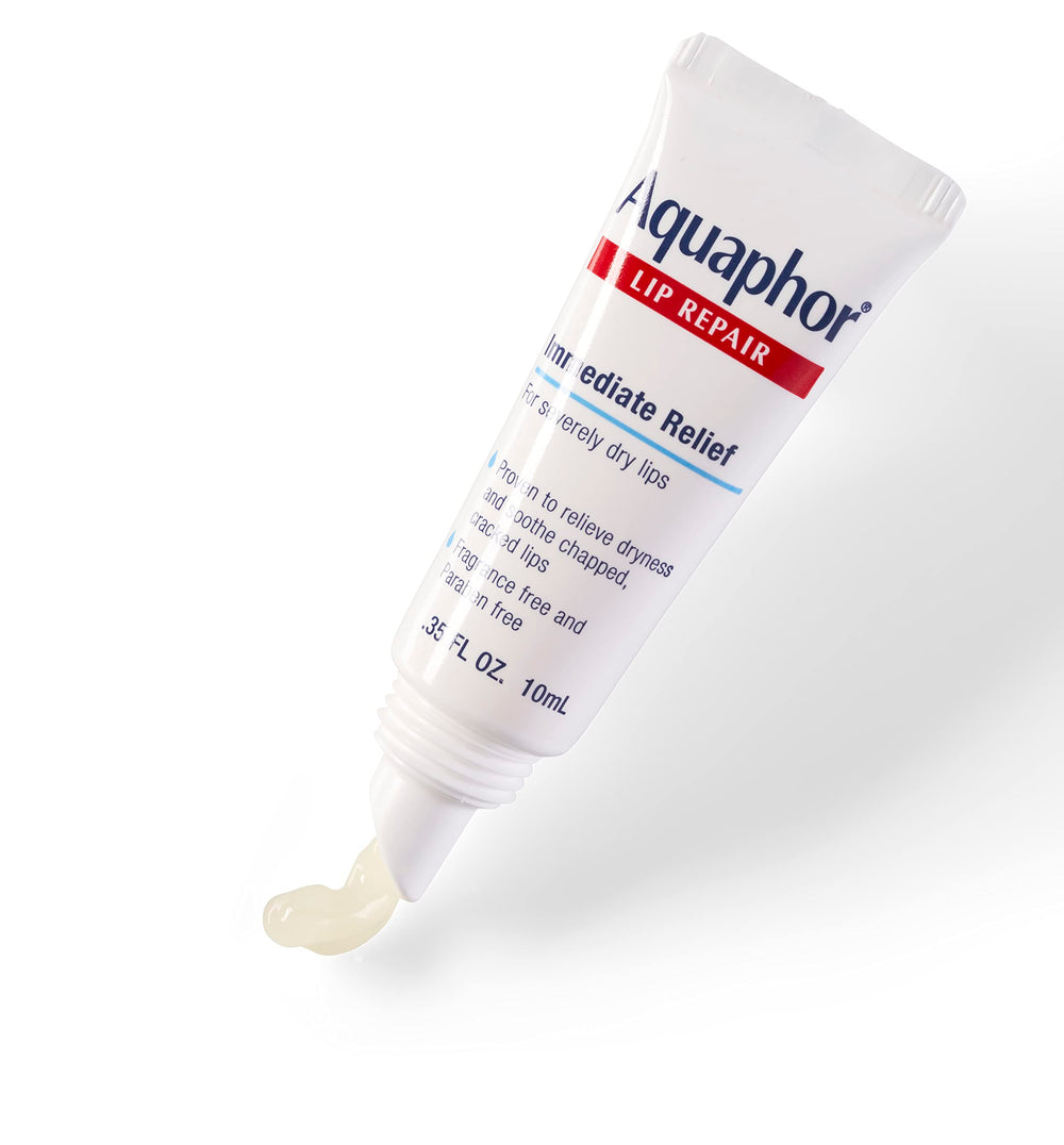 Aquaphor tube beside a makeup bag for daily lifestyle convenience