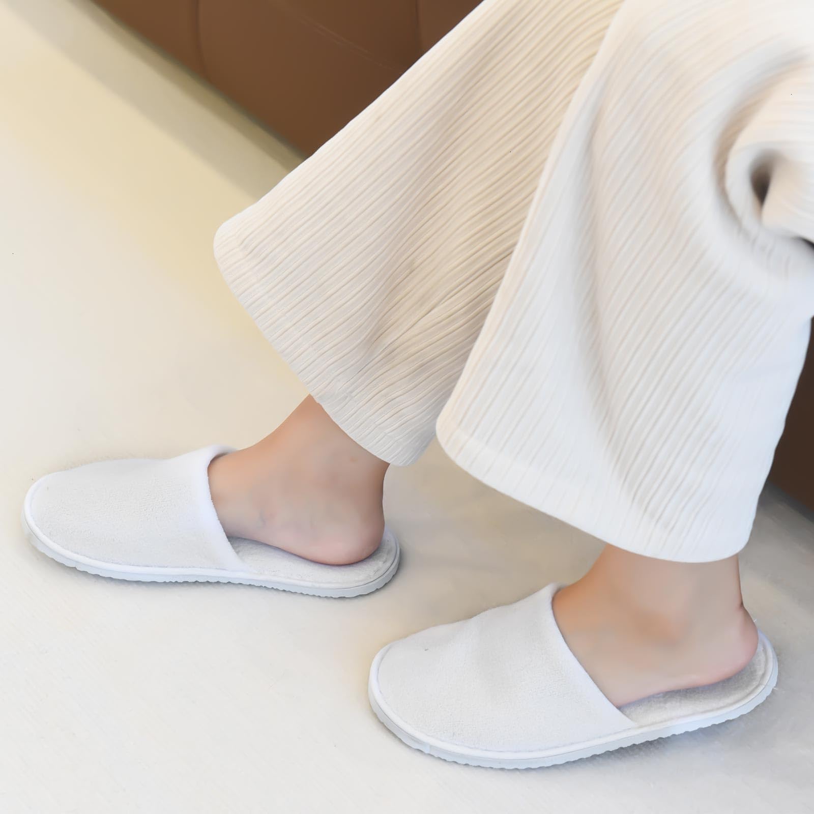AQUEENLY lightweight slippers are portable for easy guest comfort