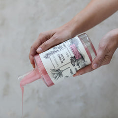 Archipelago Botanicals charcoal-rose-bath-water-stream demonstrating detoxifying soak effect.