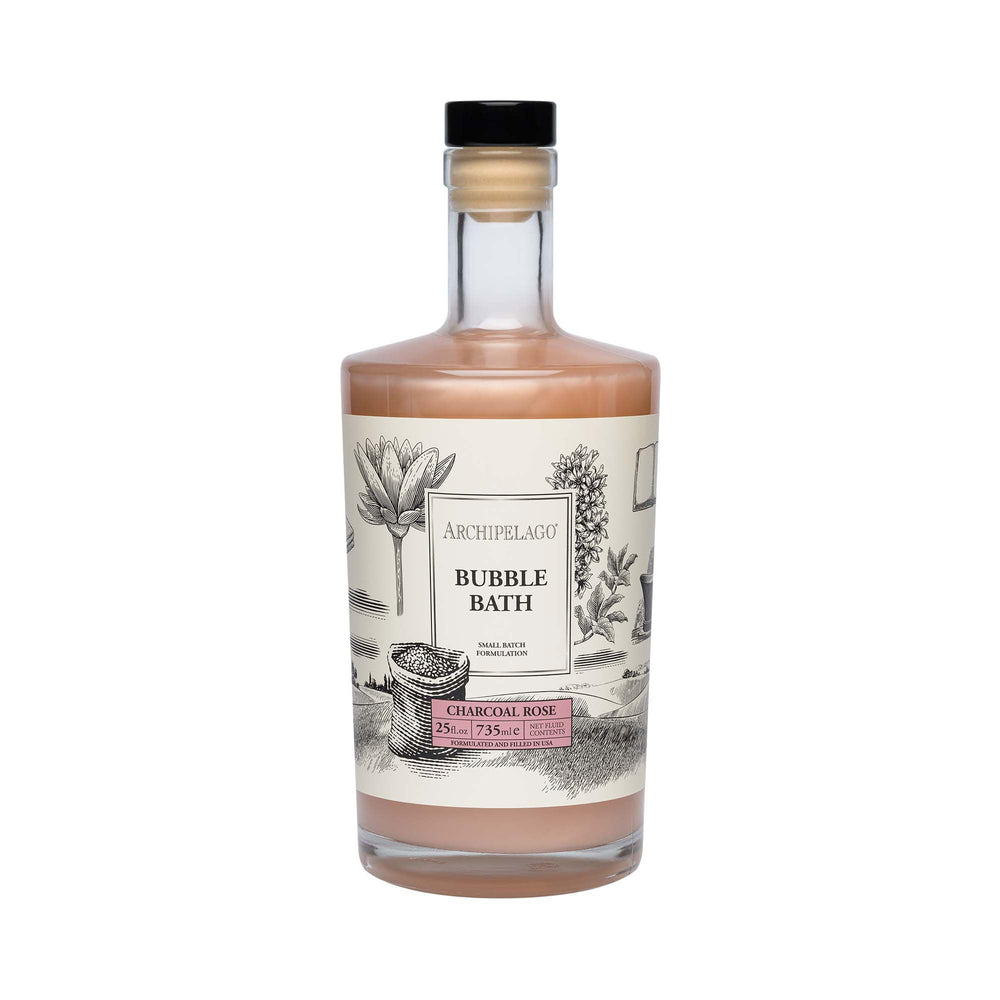 Archipelago Botanicals charcoal rose bubble bath bottle—luxurious cleansing ritual.
