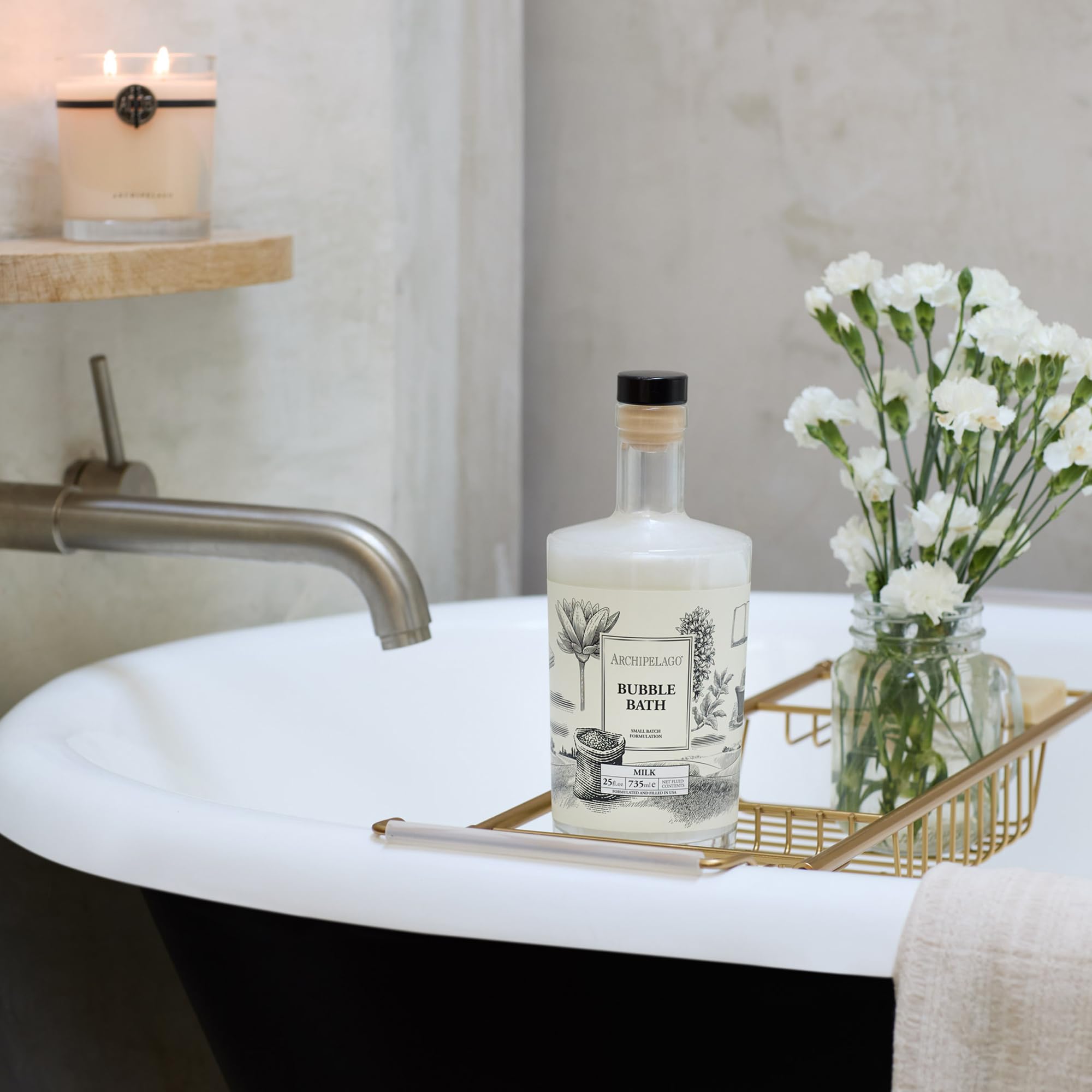 Archipelago Botanicals Luxury Milk Bubble Bath close-up shows rich foam and luxurious texture