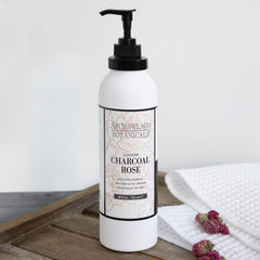 Archipelago Botanicals Charcoal Rose Lotion texture—silky glide for smooth skin hydration.