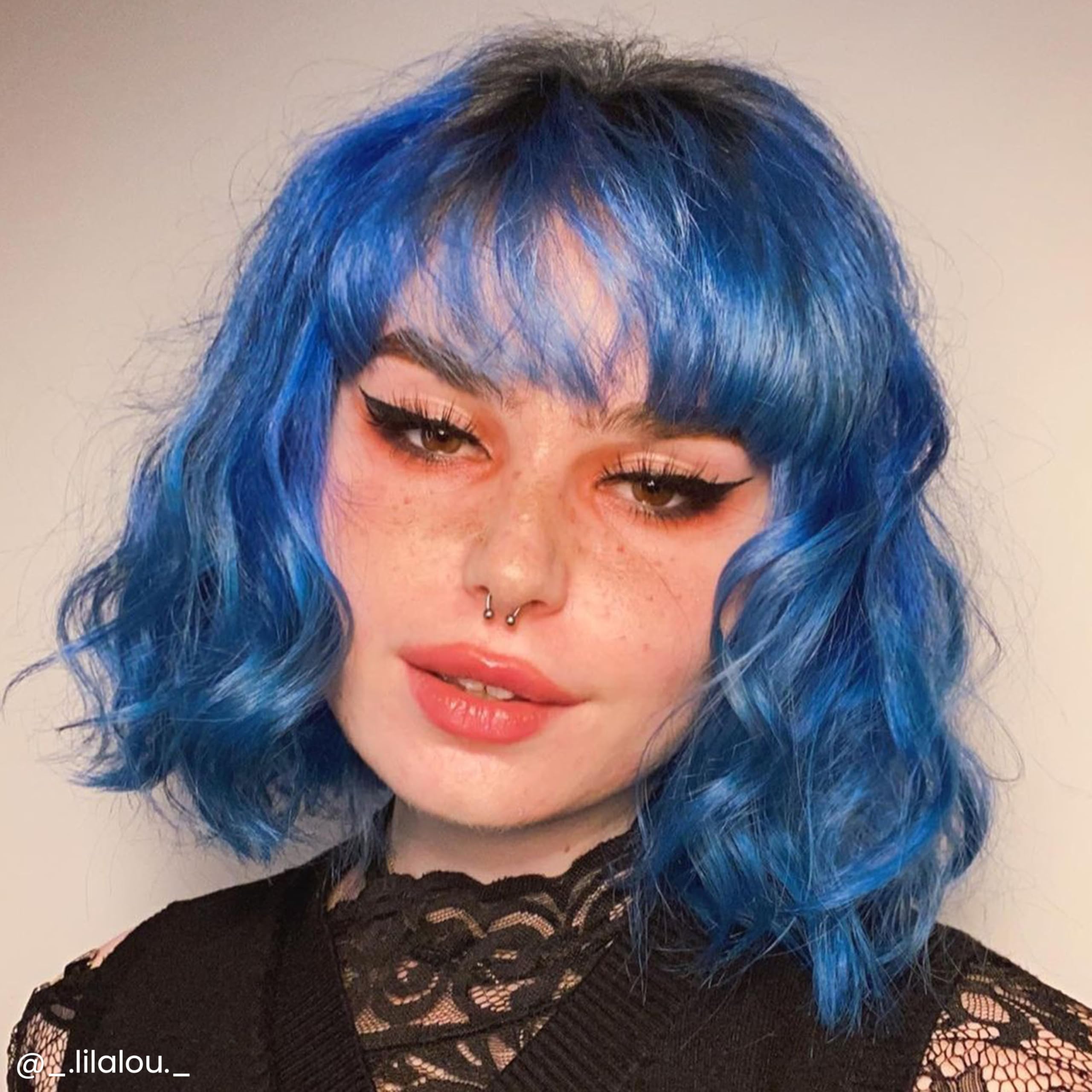 Arctic Fox Poseidon hair strands dyed blue with conditioning for shine.