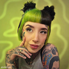 ARCTIC FOX Space Cowgirl on light hair achieving vivid green shade.