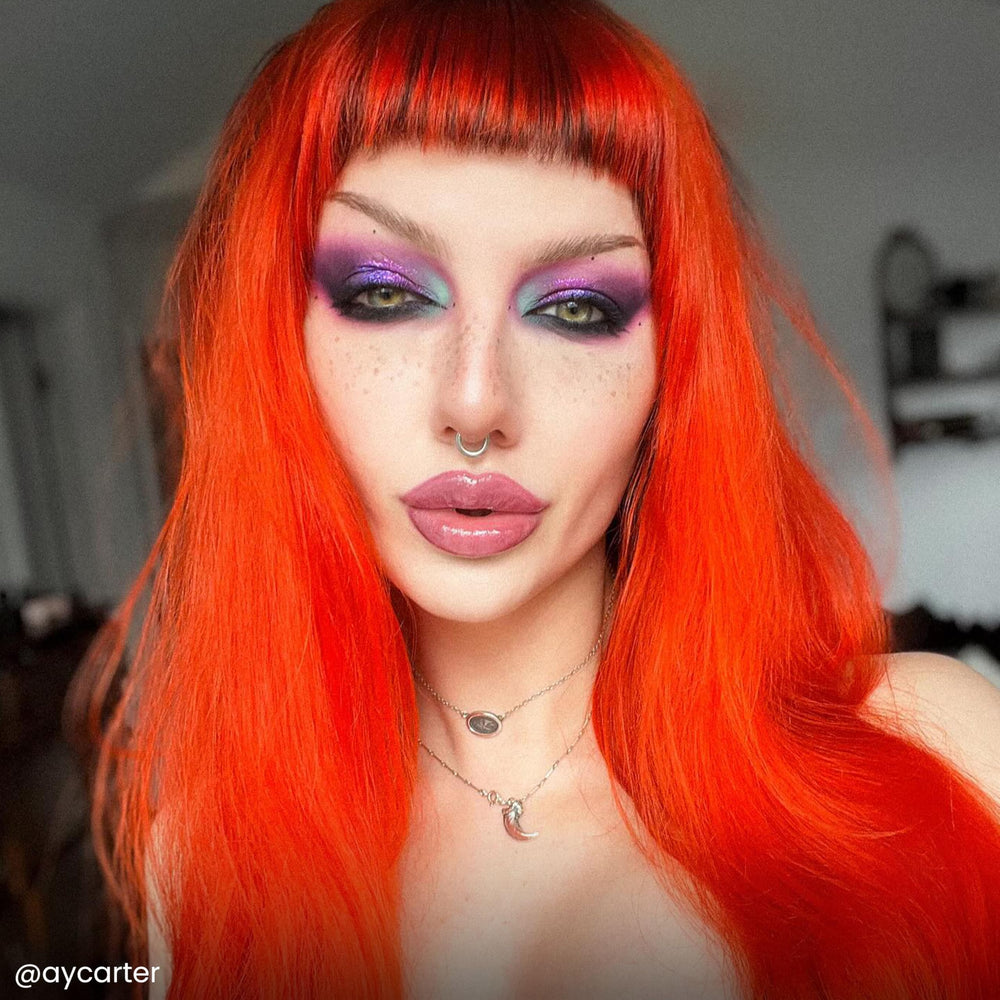 ARCTIC FOX Sunset Orange vegan formula packaging emphasizes cruelty-free, peroxide-free appeal.