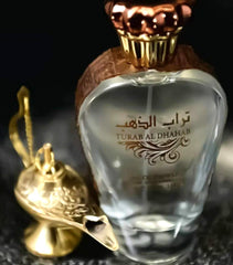 Turab Al Dhahab top-notes highlight citrus and coconut brightness.