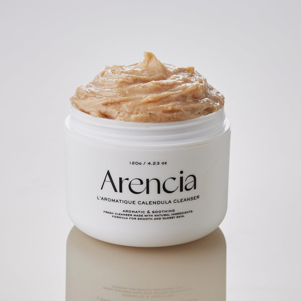 ARENCIA Calendula Rice Mochi Cleanser demonstrates gentle daily use for skincare routines.