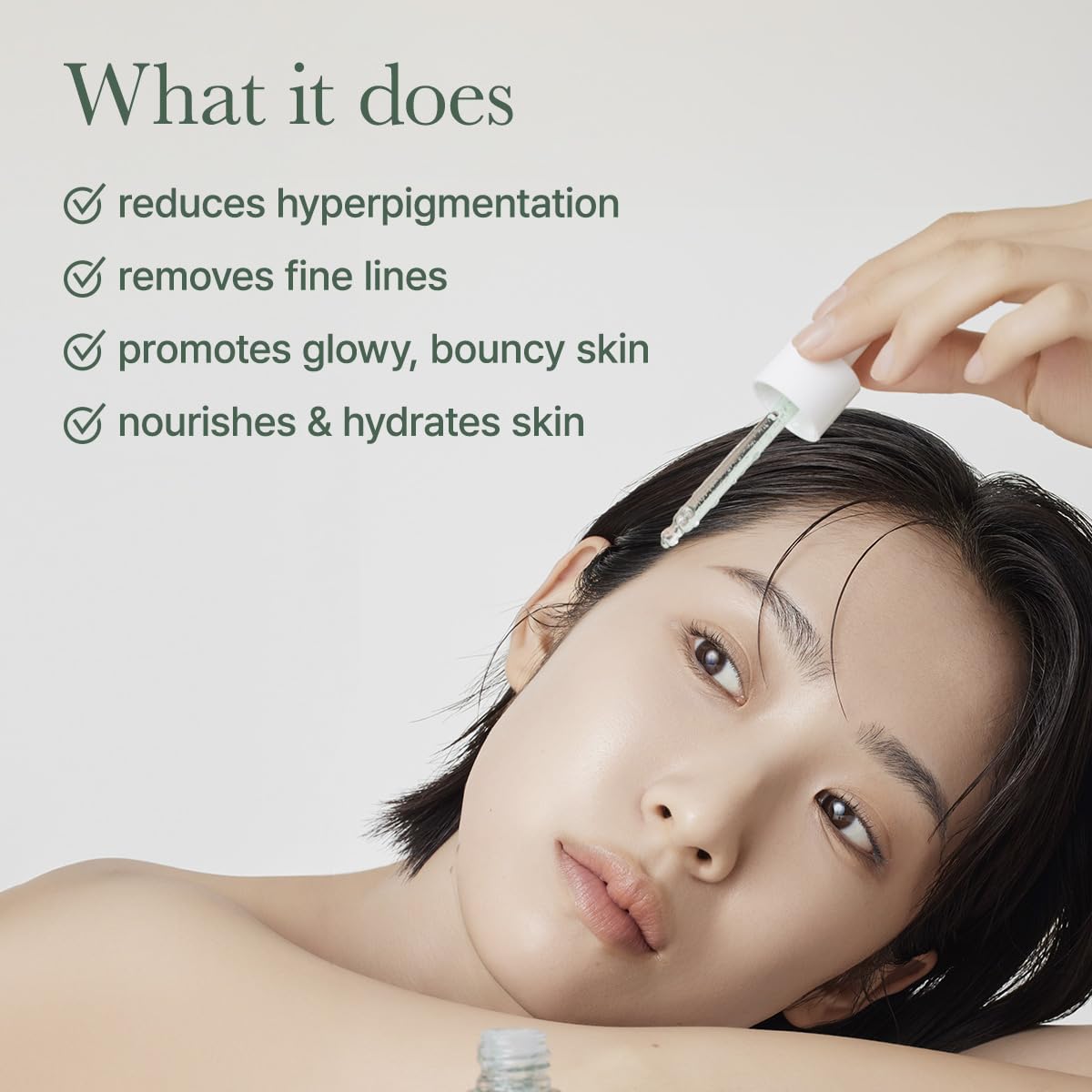 ARENCIA Hyssop Glow Serum dropper captures precise dosing for skincare