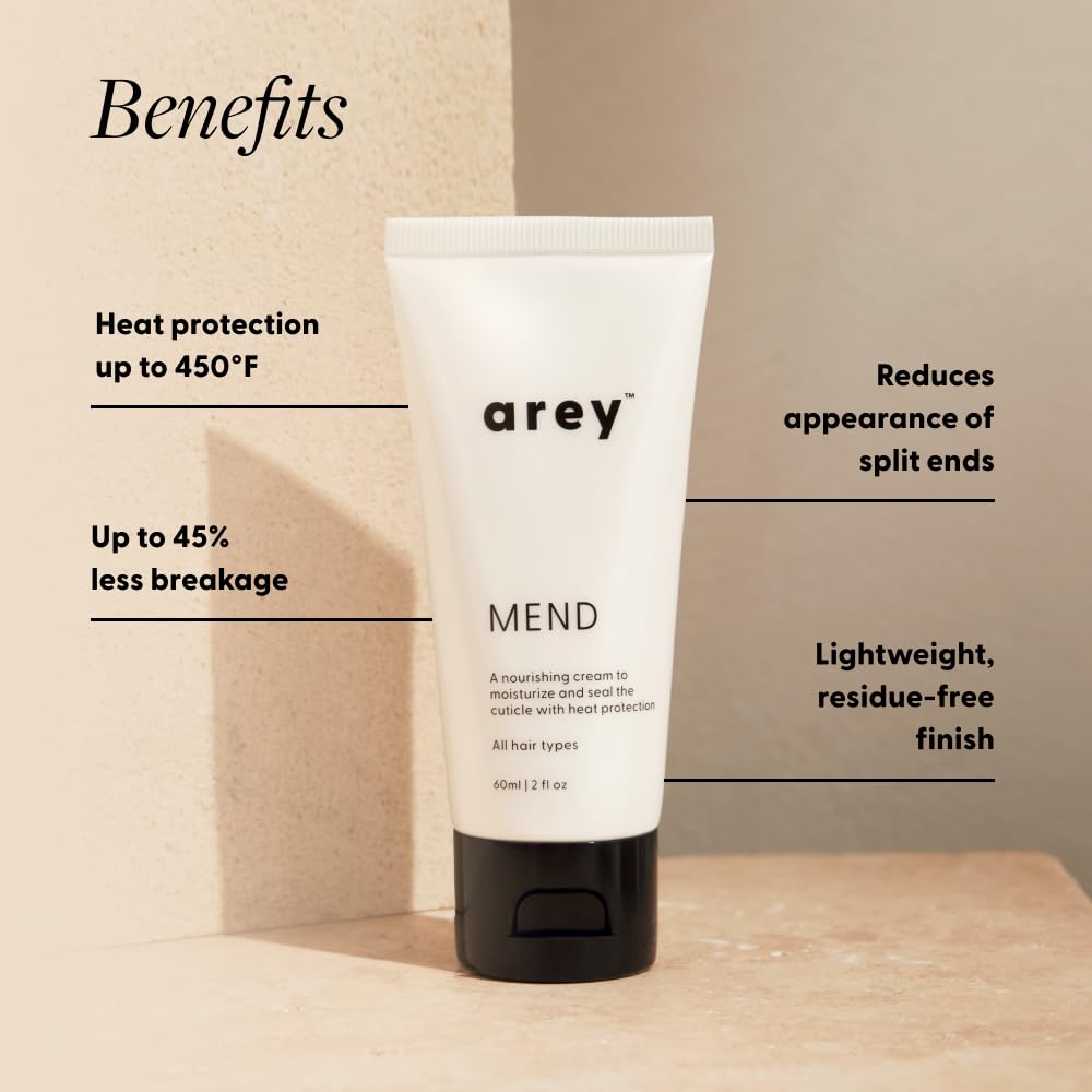 Arey Mend heat protectant bottle with cedar-sage scent delivering frizz control and freshness.