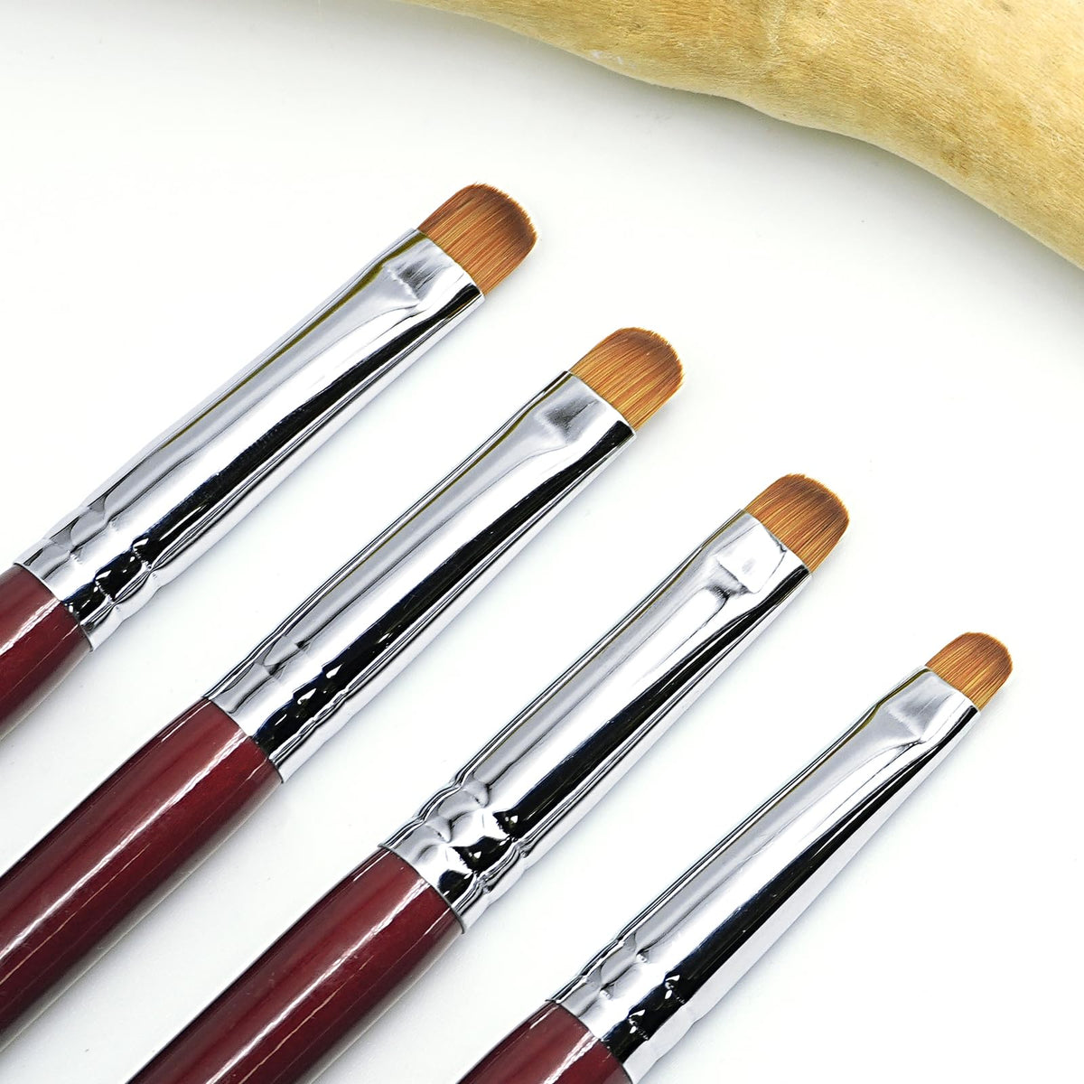 Aridito french-nail brushes closeup for precise acrylic tips and clean lines.