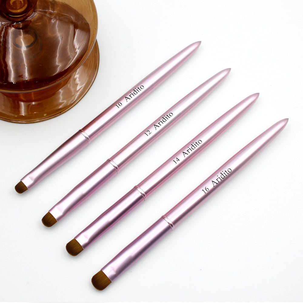 Aridito nail clean-up brush in metal finish helps tidy edges after polish.