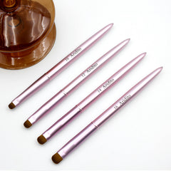 Aridito nail clean-up brush in metal finish helps tidy edges after polish.