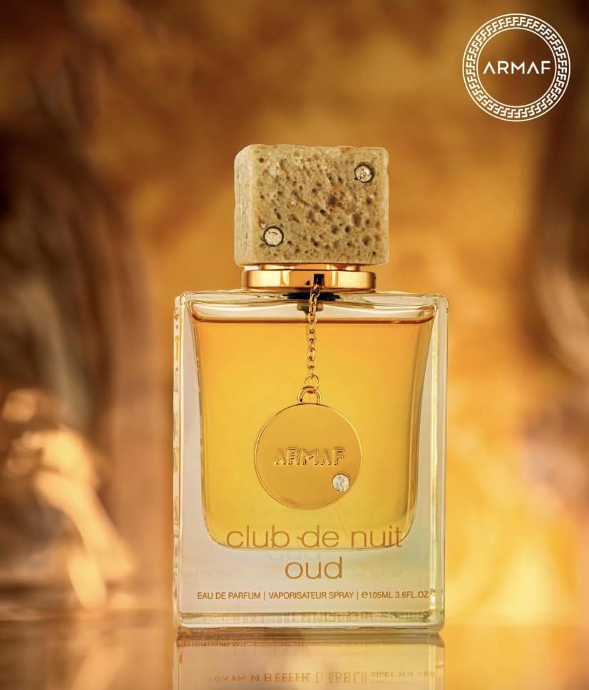 Armaf Club De Nuit Oud spray application demonstrating even mist
