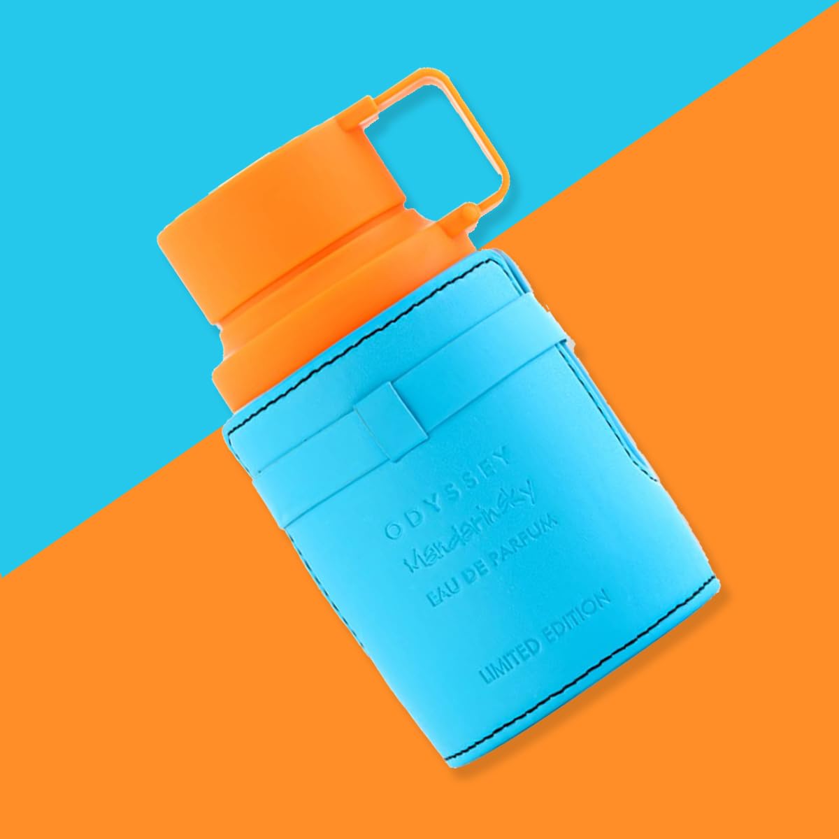 Armaf Odyssey Mandarin Sky juice in glass reveals warm amber tone and presence.