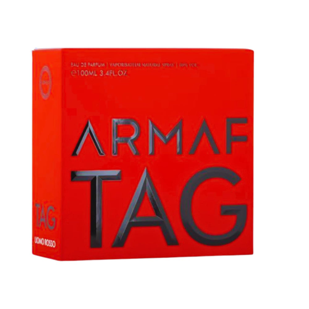 Armaf Tag Him Ummo Rosso Red bottle pump captured for a confident night-out spritz.