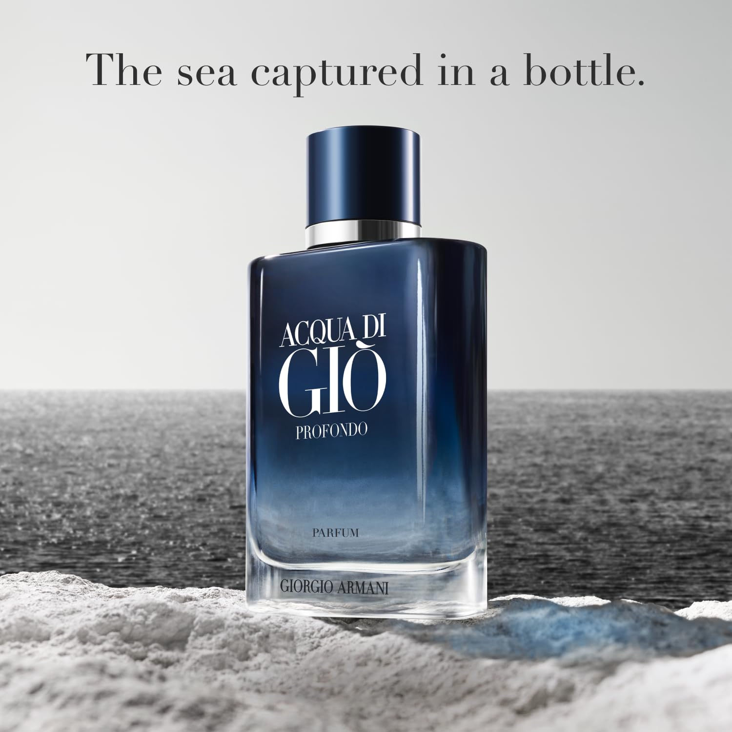 Armani Beauty Acqua di Giò Profondo cap close-up with monogram detail.