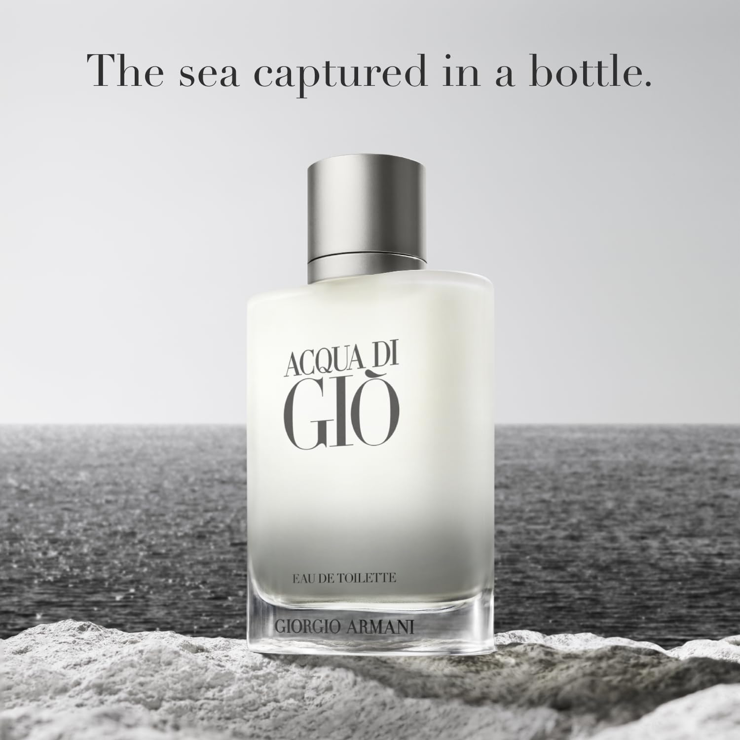 Armani Beauty Acqua di Gio spray application on pulse points for lasting freshness.