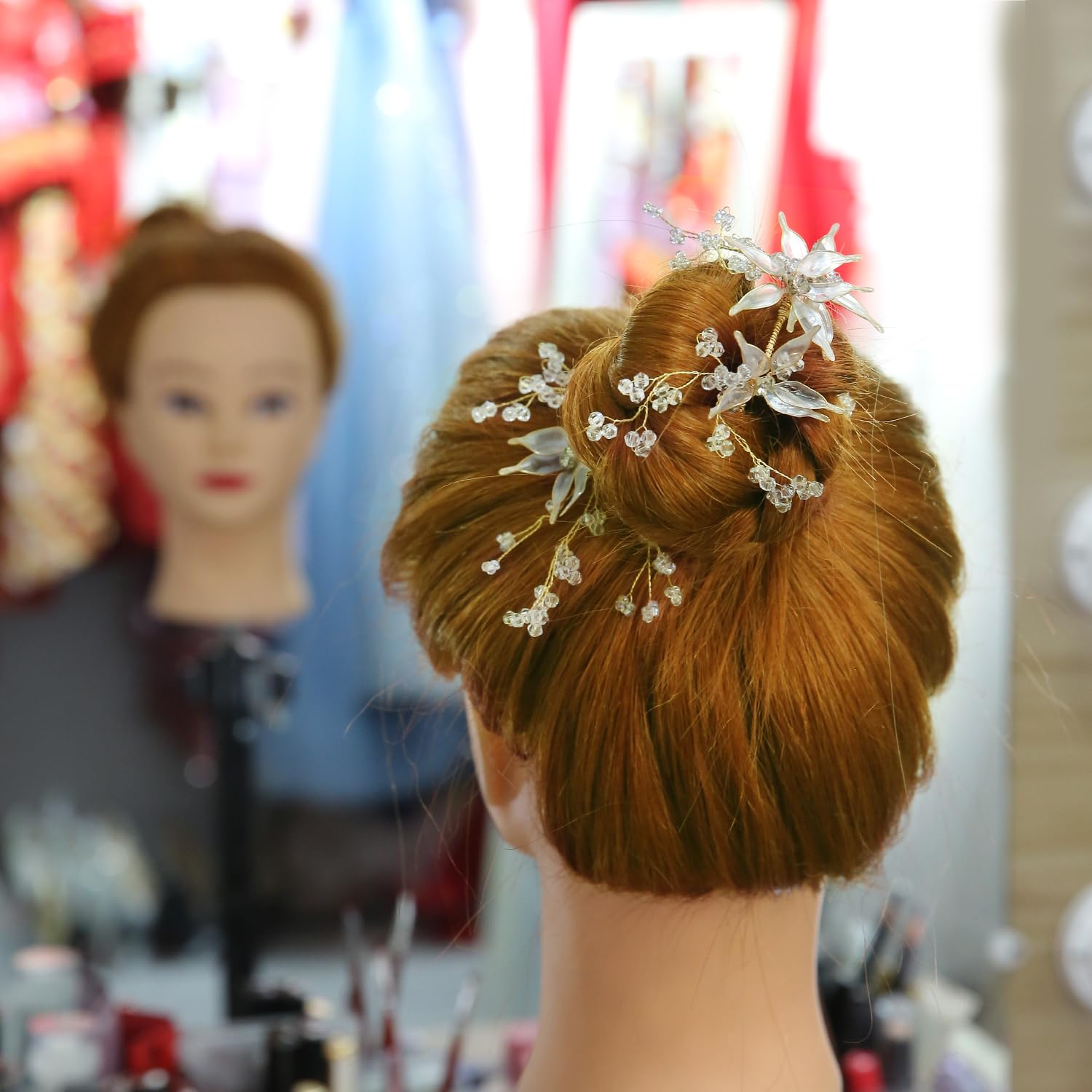 Armmu mannequin head used for braiding practice and technique refinement.