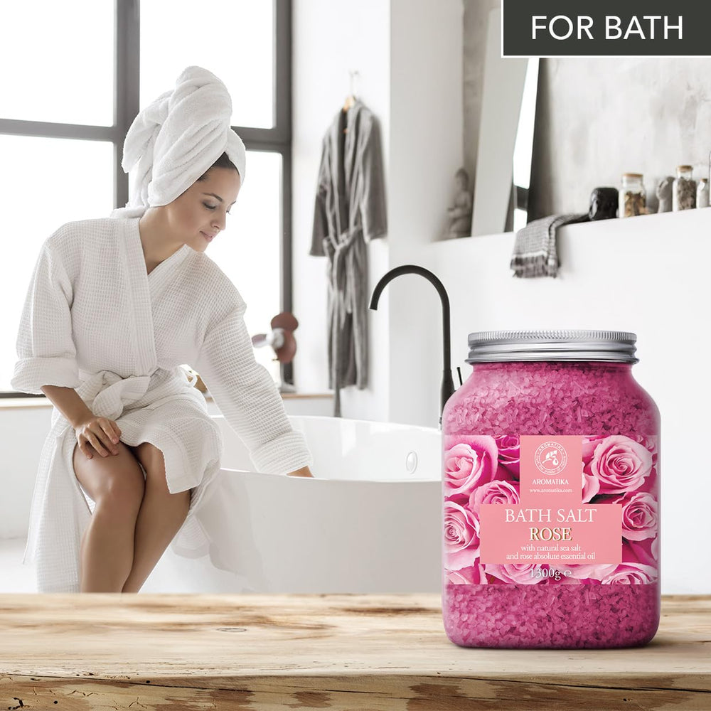 AROMATIKA jar back label highlights rose essence and sea salt base.