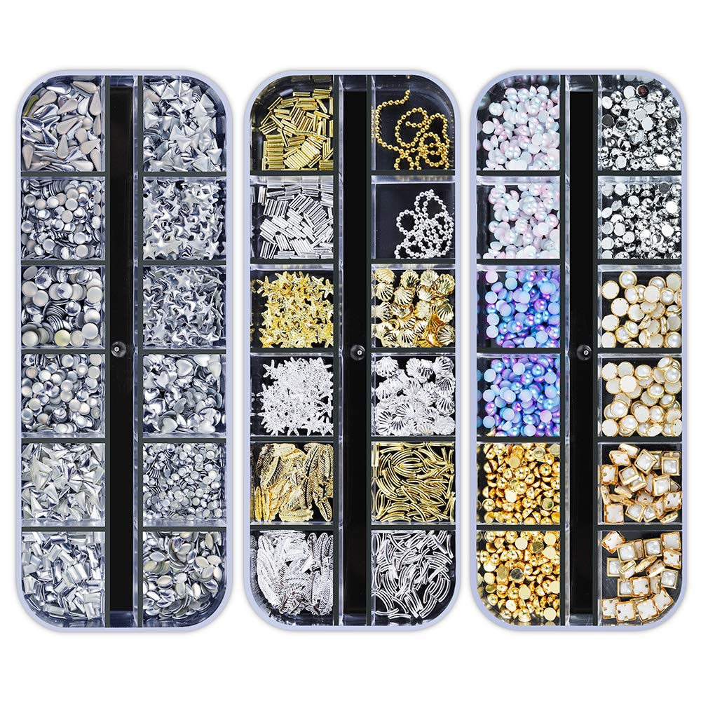 Artdone nail art studs with tweezers and pens for precise placement.