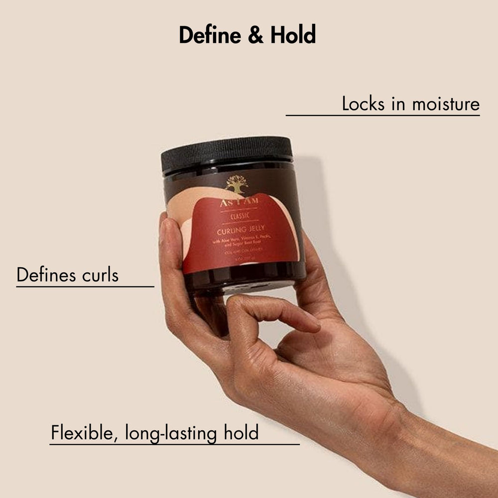As I Am Curling Jelly on wet hair sections for definition