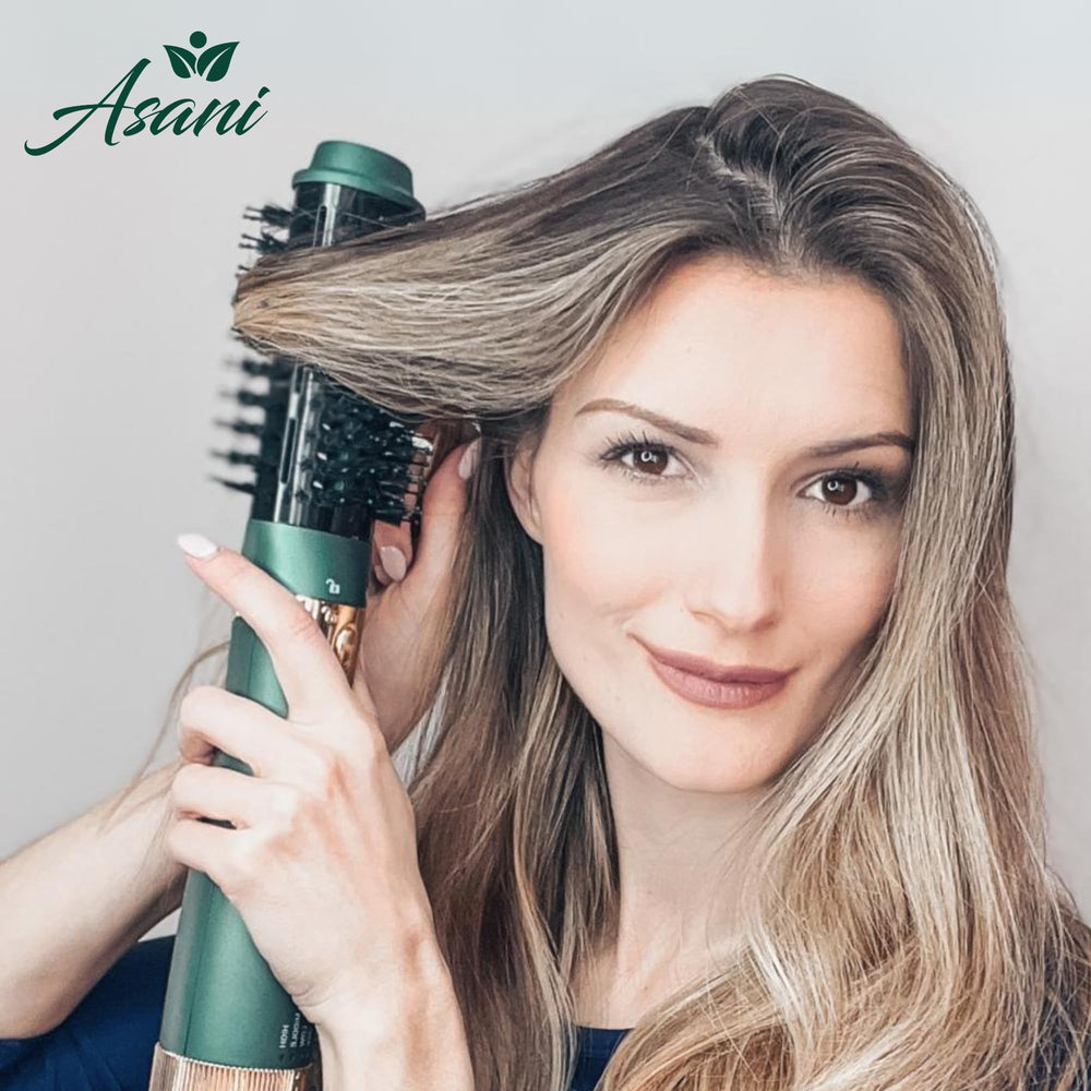 Asani hot air brush 2x1.25‑inch oval barrel for volume and curl.