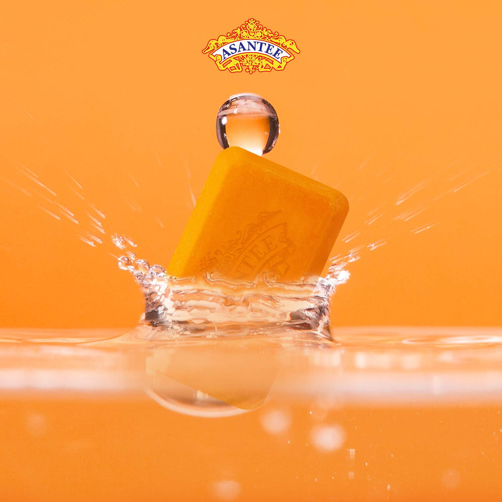 ASANTEE Papaya Honey soap bar slice highlighting natural papaya extract
