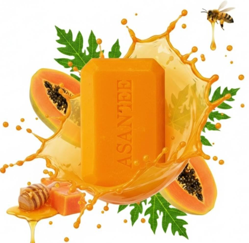ASANTEE Papaya Honey soap bar in use showing rich lather and bubbles