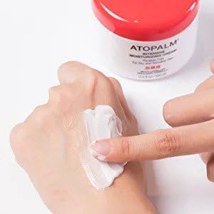 ATOPALM application motion demonstrates easy, fast-absorbing use on skin