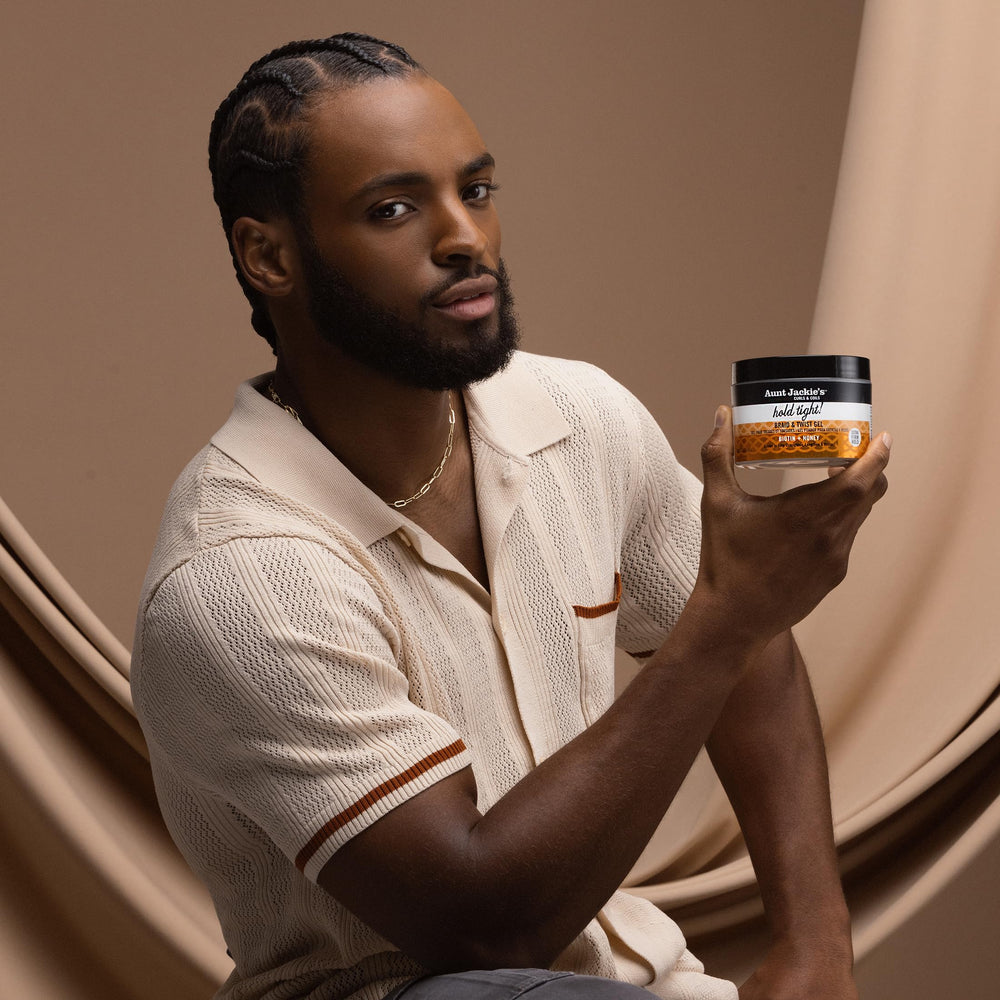 Aunt Jackie's Hold Tight gel on locs to set and protect growth