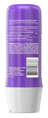 Close-up of Aussie 3 Minute Miracle Waves deep conditioner ready to spread through curls.