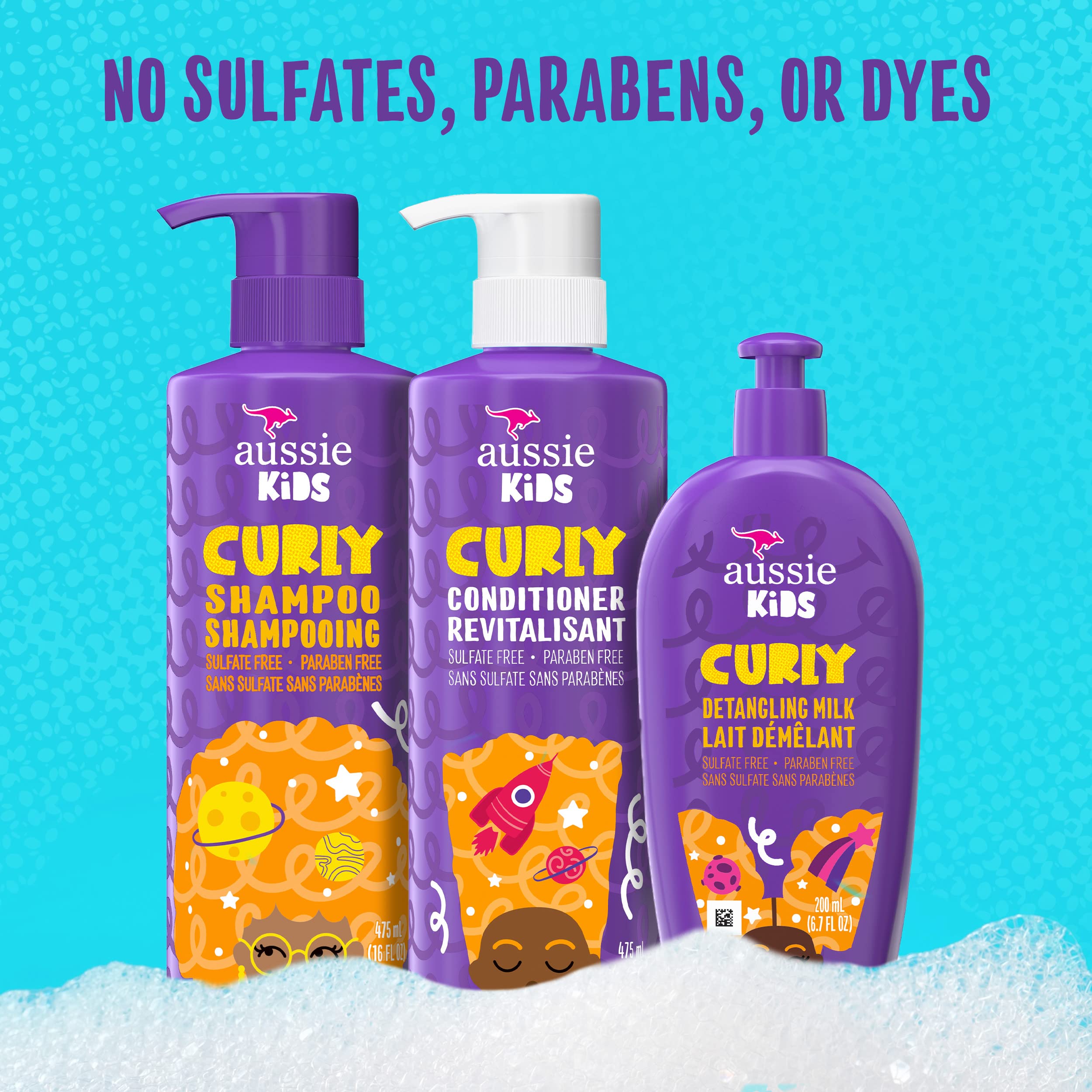 Aussie Kids curly conditioner bottle pouring for detangling and softness.